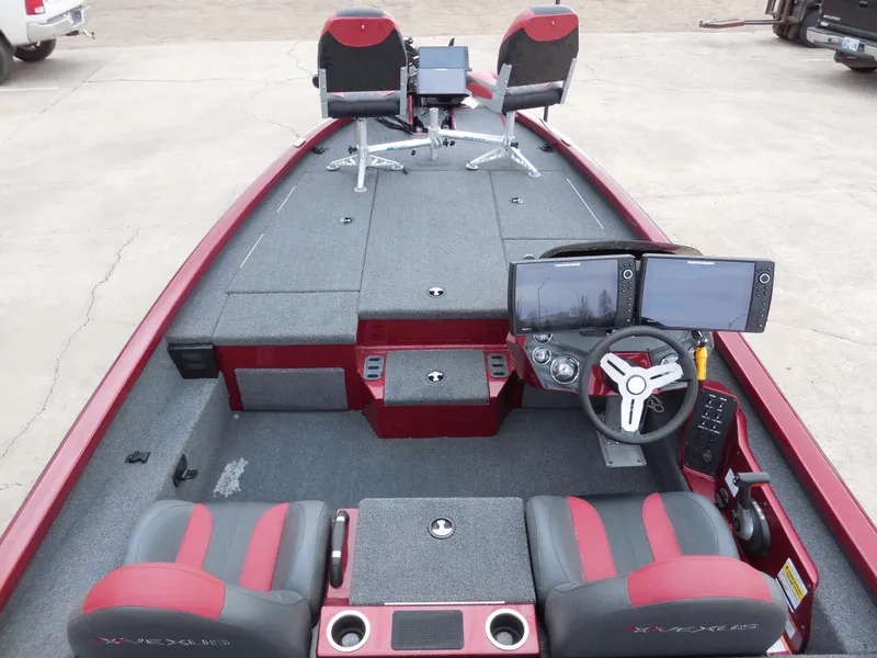 Slide: The Image of 2023 Vexus AVX1980 boat interior with dual seats and advanced navigation system. - 6