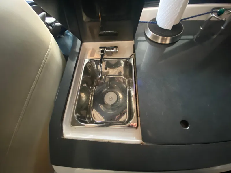 Slide: The Image of Small sink in 2012 Regal 42 Sport Coupe yacht interior. - 17