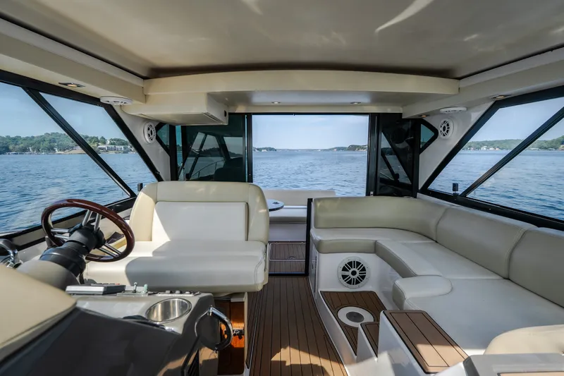 Slide: The Image of Luxurious interior of 2012 Regal 42 Sport Coupe yacht with scenic water view. - 36