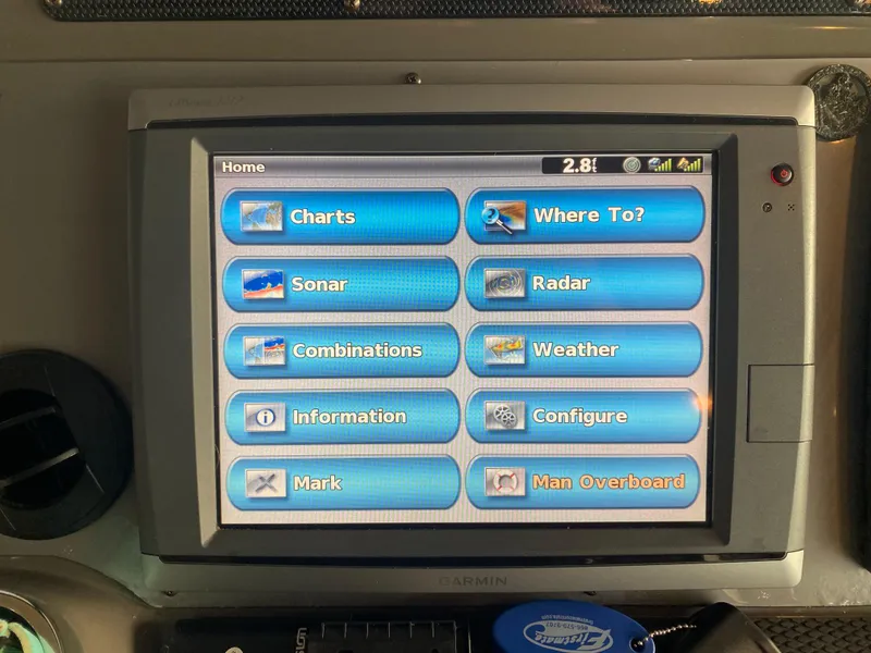 Slide: The Image of Touchscreen navigation system on a 2012 Regal 42 Sport Coupe boat. - 23
