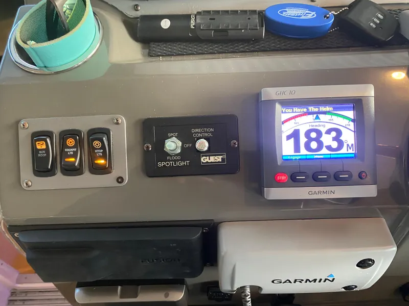 Slide: The Image of Control panel of a 2012 Regal 42 Sport Coupe with Garmin navigation display. - 26