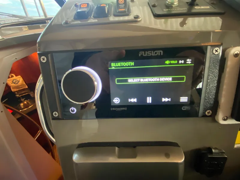 Slide: The Image of Control panel of a 2012 Regal 42 Sport Coupe with Bluetooth audio system. - 31