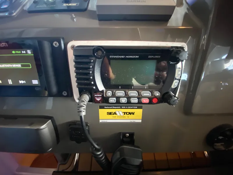 Slide: The Image of Control panel of a 2012 Regal 42 Sport Coupe with Standard Horizon radio. - 32