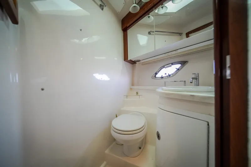 Slide: The Image of Luxurious bathroom in 2012 Regal 42 Sport Coupe yacht with modern fixtures. - 54