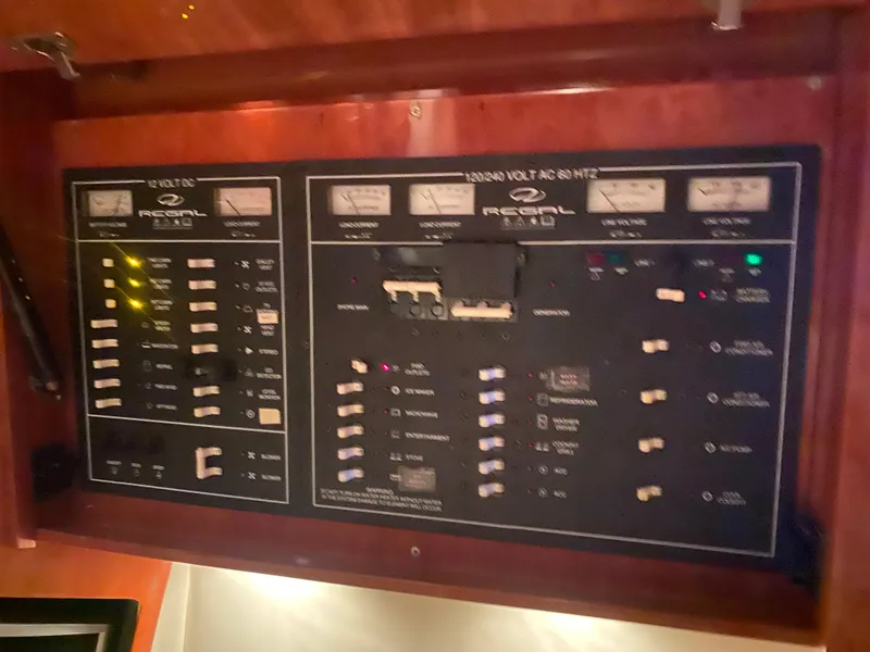 Slide: The Image of Control panel of a 2012 Regal 42 Sport Coupe boat. - 50