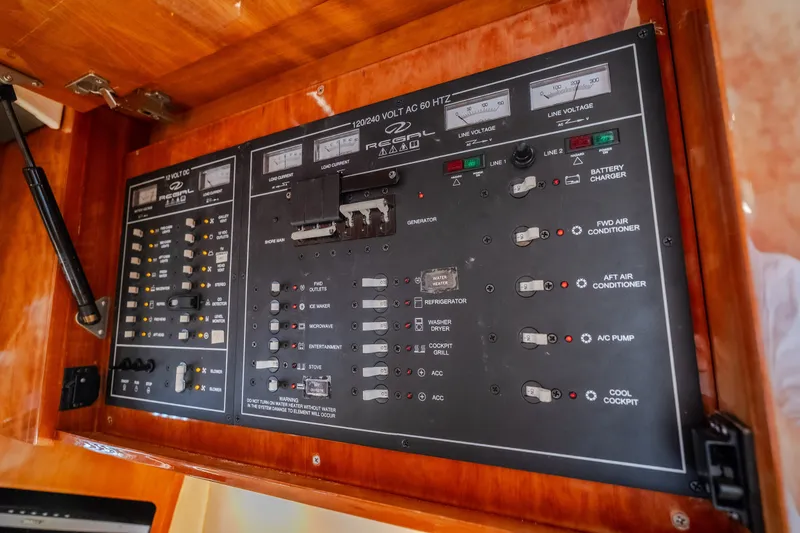 Slide: The Image of Electrical control panel of a 2012 Regal 42 Sport Coupe yacht. - 48