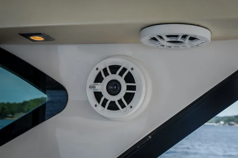 Slide: The Image of Speaker system on a 2012 Regal 42 Sport Coupe yacht interior. - 65