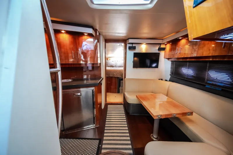 Slide: The Image of Luxurious interior of a 2012 Regal 42 Sport Coupe yacht with modern amenities. - 45