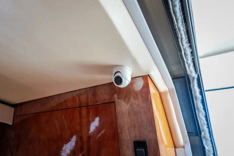 Slide: The Image of Security camera inside 2012 Regal 42 Sport Coupe yacht interior. - 59
