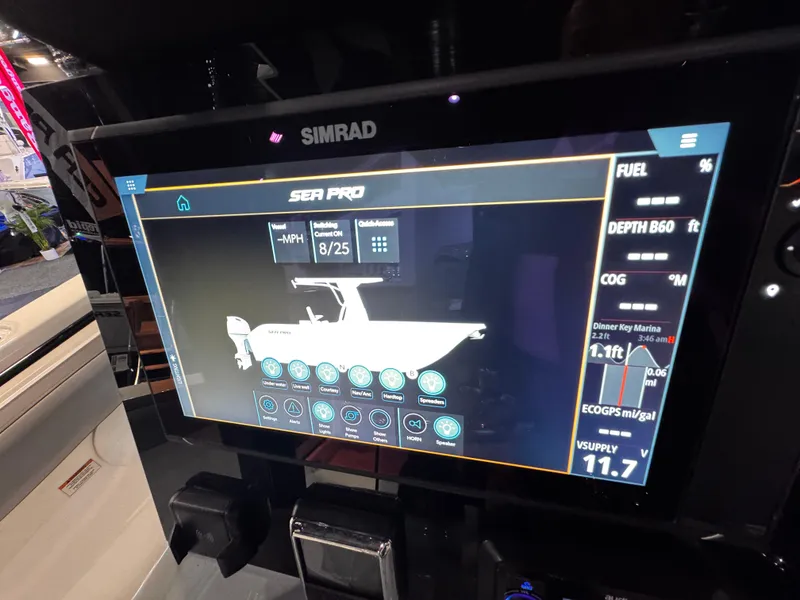 Slide: The Image of Simrad display on 2025 Sea Pro 292 DLX boat showing navigation and performance data. - 20