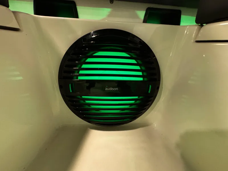 Slide: The Image of Audison speaker with green LED lighting in 2025 Sea Pro 292 DLX boat. - 33