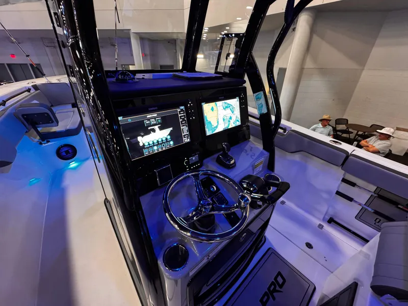 Slide: The Image of 2025 Sea Pro 292 DLX boat interior with advanced navigation system and sleek design. - 37