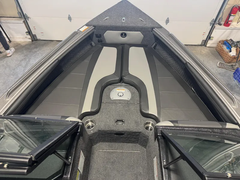 Slide: The Image of Interior of 2025 Lund 1975 Tyee boat, featuring sleek seating and modern design. - 8