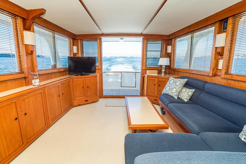 Slide: The Image of Luxurious interior of 1987 Fleming 50 Raised Pilothouse yacht with ocean view. - 14