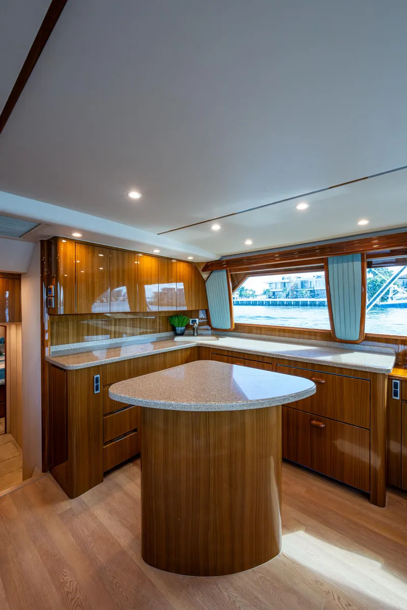 Slide: The Image of Luxurious interior of 2016 Viking 46 Convertible yacht with polished wood and modern design. - 19