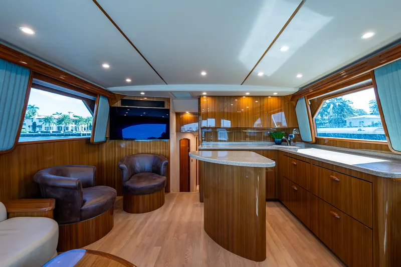 Slide: The Image of Luxurious interior of 2016 Viking 46 Convertible yacht with elegant wood finishes. - 2
