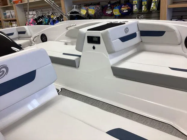 Slide: The Image of 2024 Hurricane SS-185 OB boat interior with white and blue seating. - 9