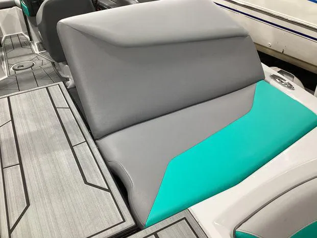 Slide: The Image of 2024 ATX Surf Boats 22ATX interior with gray and teal seating. - 3