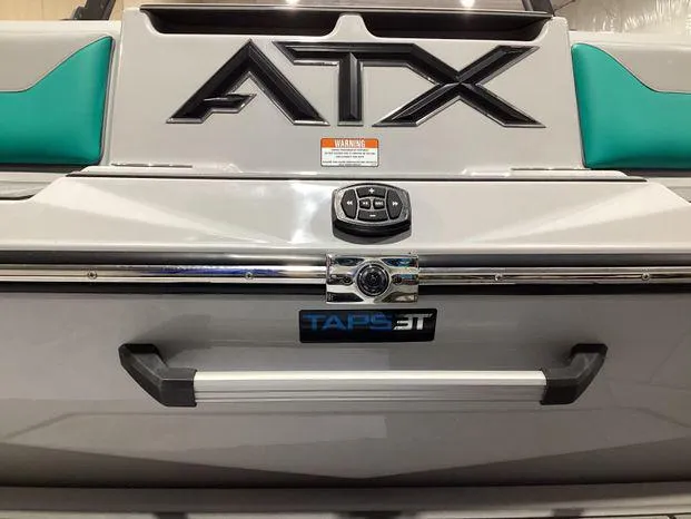 Slide: The Image of 2024 ATX Surf Boats 22ATX rear view with TAPS 3T system. - 6