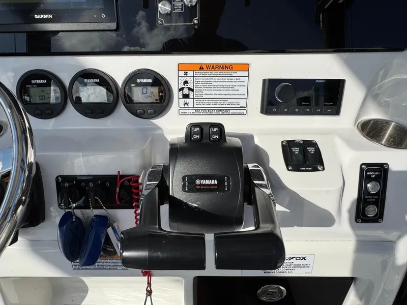 Slide: The Image of Control panel of 2023 Sea Fox 268 Commander boat with Yamaha gauges and controls. - 14