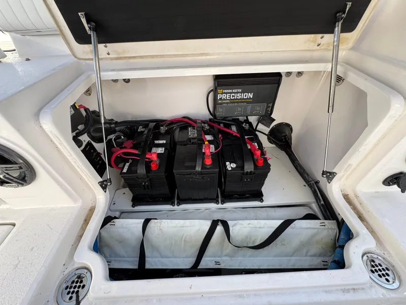 Slide: The Image of Battery compartment of 2023 Sea Fox 268 Commander boat with precision charger. - 23