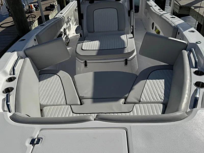 Slide: The Image of 2023 Sea Fox 268 Commander boat interior with cushioned seating and modern design. - 30