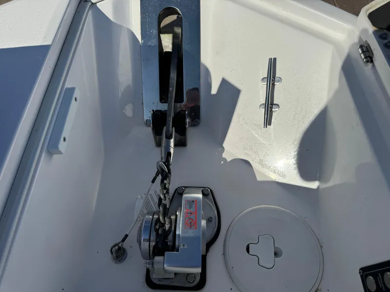 Slide: The Image of Anchor compartment of 2023 Sea Fox 268 Commander boat with winch and cleat. - 33