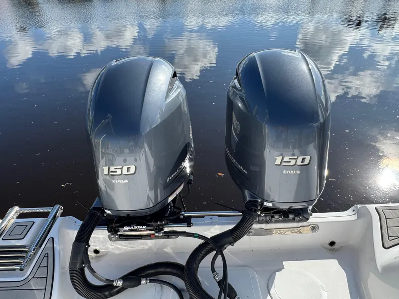 Slide: The Image of Twin Yamaha 150 outboard engines on a 2023 Sea Fox 268 Commander boat. - 34