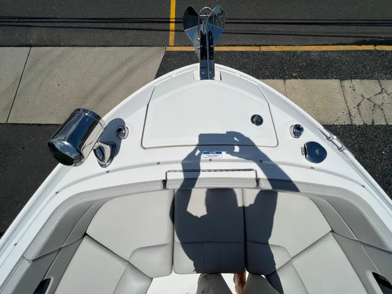 Slide: The Image of Bow of 2022 Sea Ray SLX 310 boat with seating and anchor. - 26