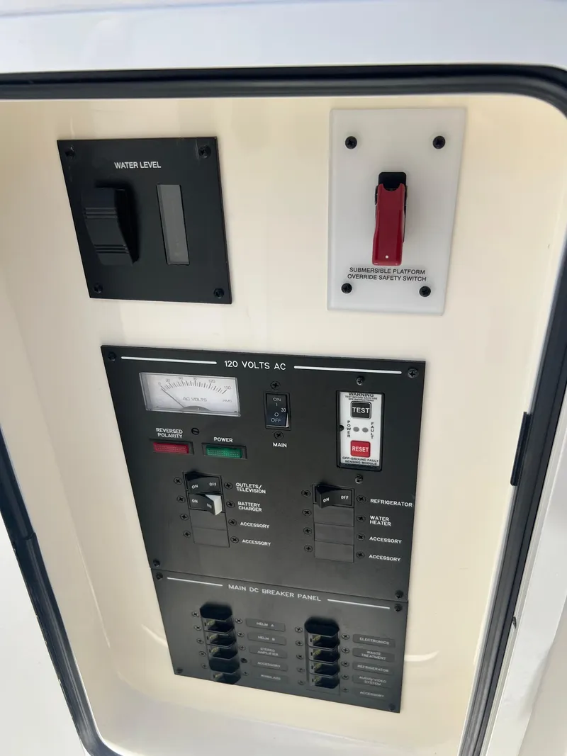 Slide: The Image of Electrical control panel on a 2022 Sea Ray SLX 310 boat. - 37