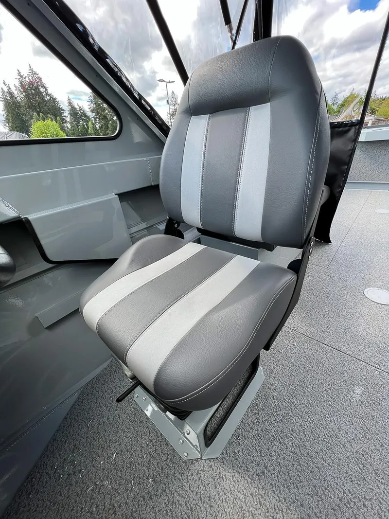 Slide: The Image of 2023 Hewescraft 200 PRO V ET boat seat, gray and black upholstery, interior view. - 10