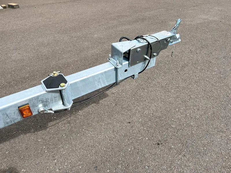 Slide: The Image of Trailer hitch of 2023 Hewescraft 200 PRO V ET on asphalt surface. - 18