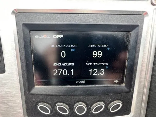 Slide: The Image of Dashboard display of a 2018 MasterCraft NXT22 showing engine metrics. - 19