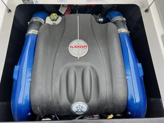 Slide: The Image of 2018 MasterCraft NXT22 Ilmor engine with blue components. - 20