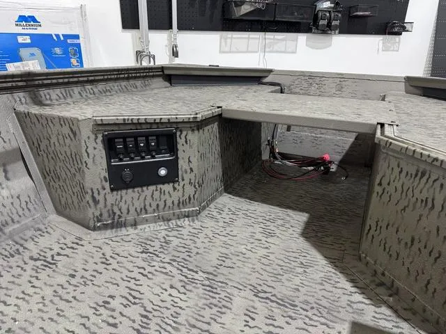 Slide: The Image of Interior of 2025 War Eagle MODEL 750 - GLADIATOR boat with control panel. - 9