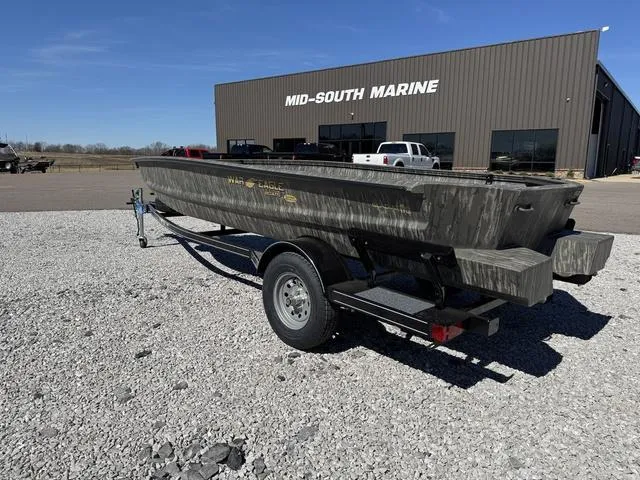 Slide: The Image of 2025 War Eagle MODEL 750 - GLADIATOR boat on trailer at Mid-South Marine dealership. - 2
