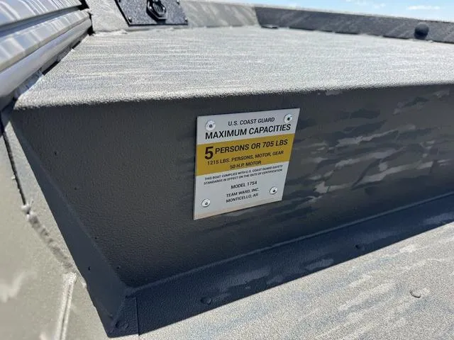 Slide: The Image of 2025 War Eagle 754 LDV boat capacity label, indicating a maximum of 5 persons or 705 lbs. - 9