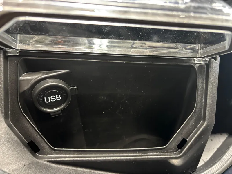Slide: The Image of USB port in 2023 Kawasaki ULTRA 160LX storage compartment. - 10