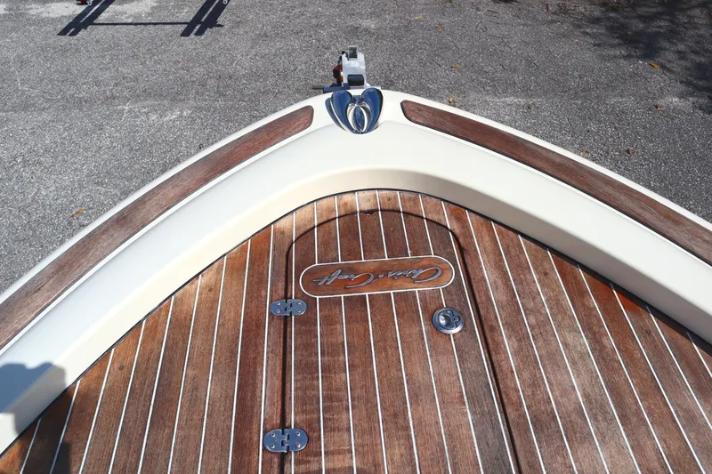 Slide: The Image of 2020 Chris-Craft Calypso 30 boat with wooden deck detail. - 34