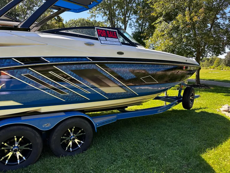 Slide: The Image of 2017 Monterey M6 boat for sale on trailer, parked on grass. - 39