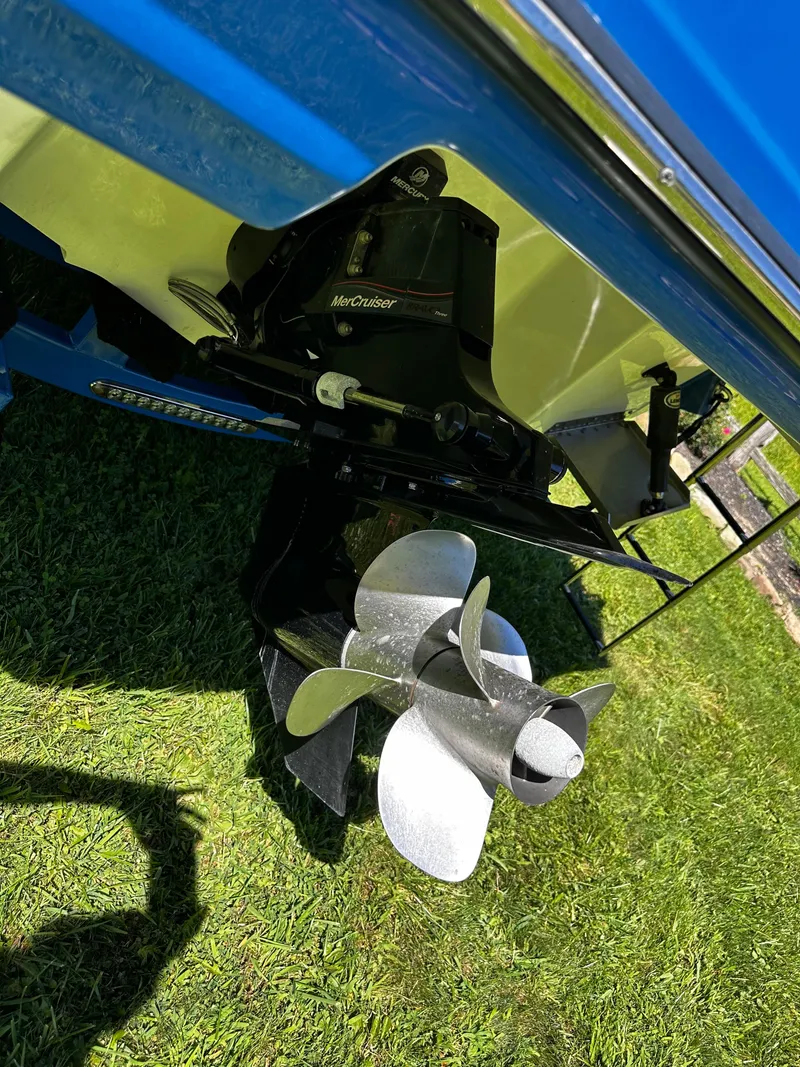 Slide: The Image of 2017 Monterey M6 boat propeller and stern drive on grass. - 43