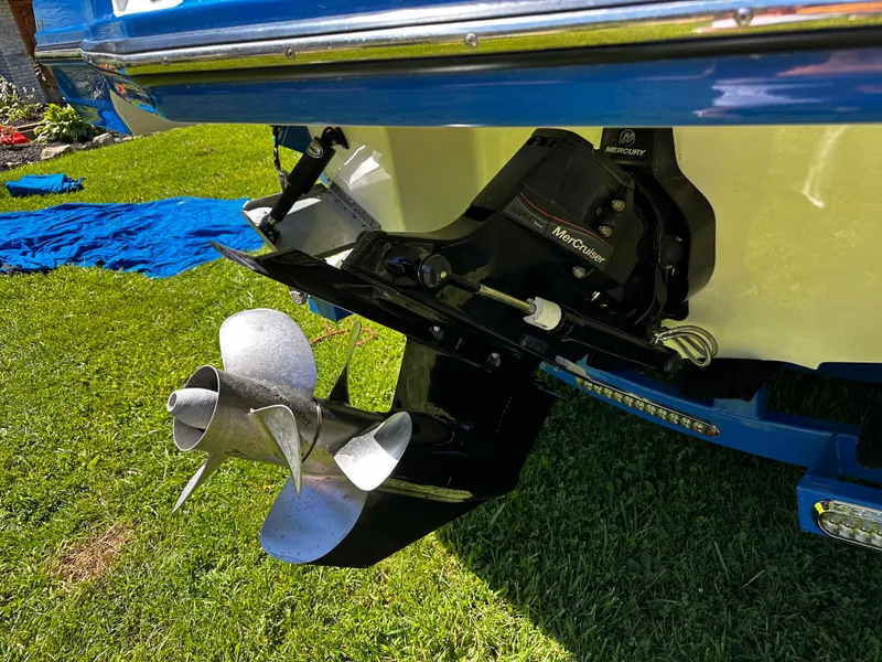 Slide: The Image of 2017 Monterey M6 boat with MerCruiser outdrive and propeller on grass. - 44