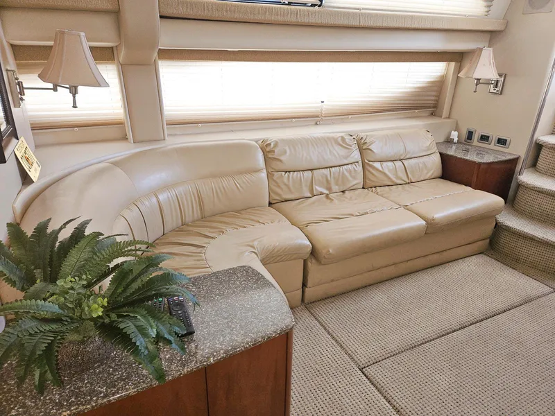 Slide: The Image of Luxurious interior of 2005 Meridian 368 Motoryacht with beige leather sofa and elegant decor. - 10