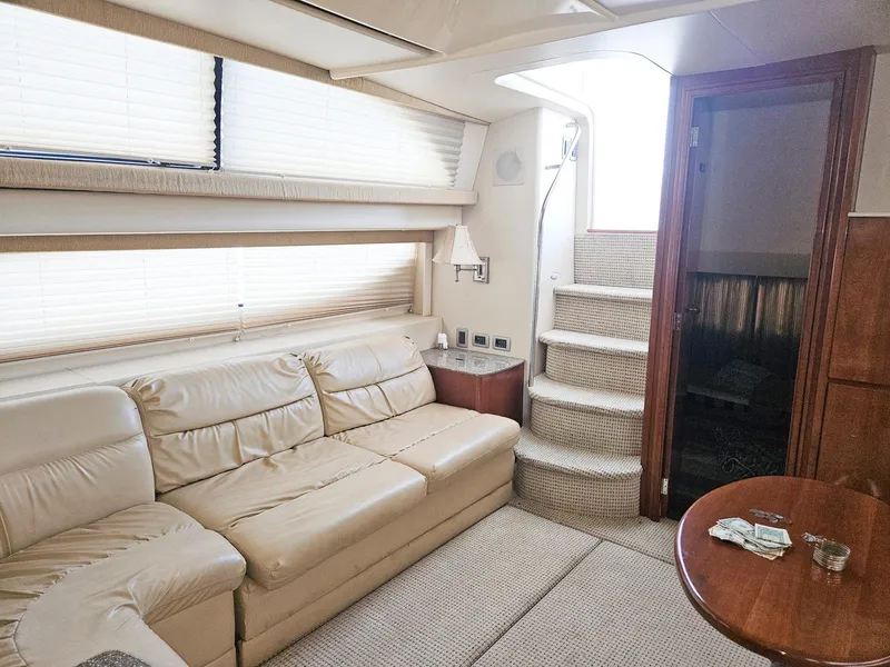 Slide: The Image of Luxurious interior of 2005 Meridian 368 Motoryacht with beige leather seating and elegant decor. - 12