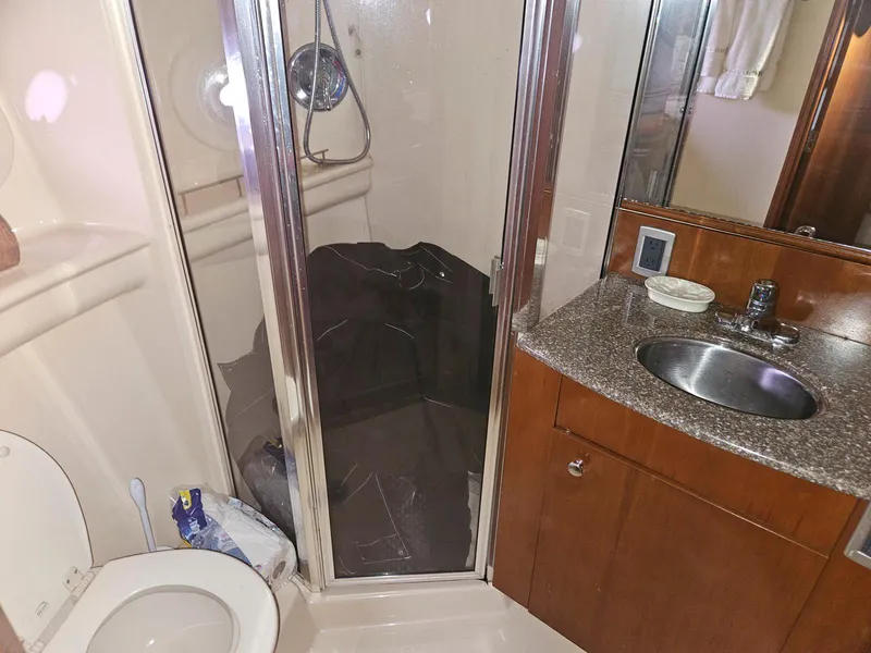 Slide: The Image of Bathroom interior of 2005 Meridian 368 Motoryacht with shower, sink, and toilet. - 19