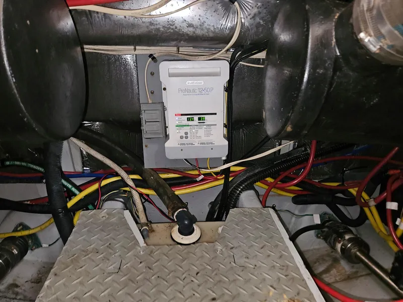 Slide: The Image of Engine room of 2005 Meridian 368 Motoryacht with wiring and control panel. - 27