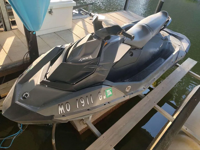 The Image of 2015 Sea-Doo Spark 2up jet ski docked by the water. - 0