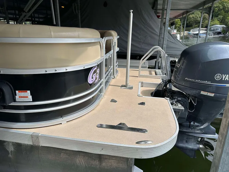 Slide: The Image of 2013 G3 SunCatcher V322 RC pontoon boat with Yamaha outboard motor at dock. - 20