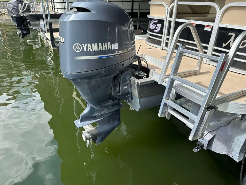 Slide: The Image of 2013 G3 SunCatcher V322 RC pontoon boat with Yamaha outboard motor in water. - 28