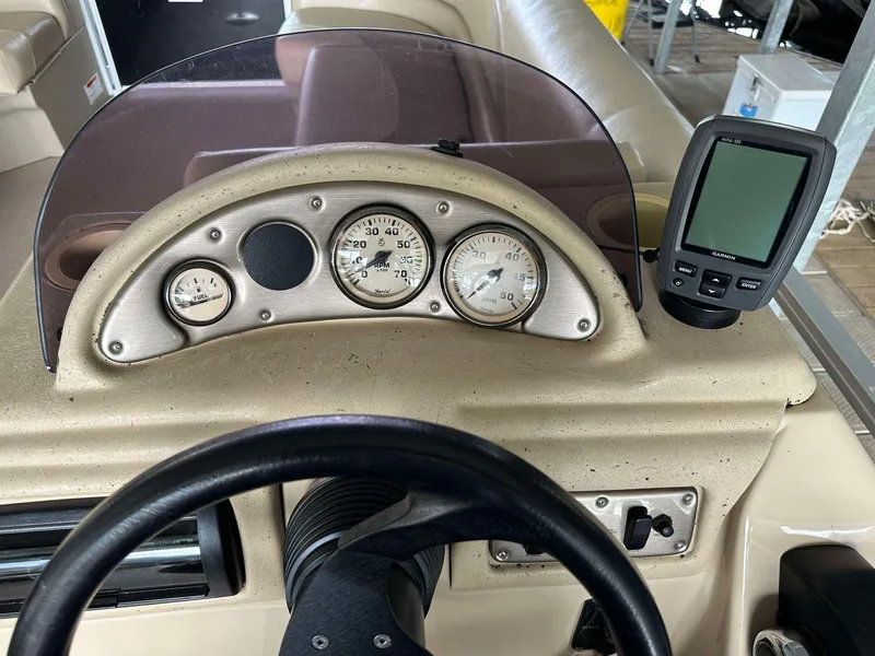 Slide: The Image of Dashboard of 2013 G3 SunCatcher V322 RC boat with gauges and navigation device. - 31